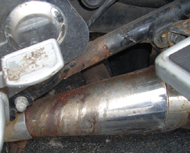 Acid damage to an exhaust pipe - www.MotorCycles123.com