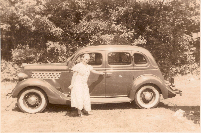 Imelda (Audette) Savoie with a car